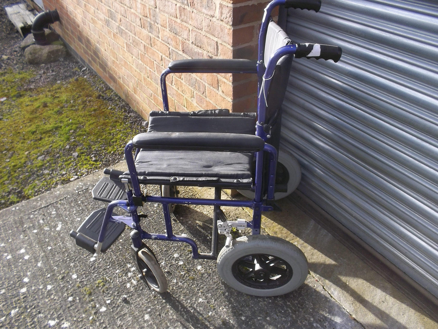 The Invacare Alu Lite Manual Transit Wheelchair