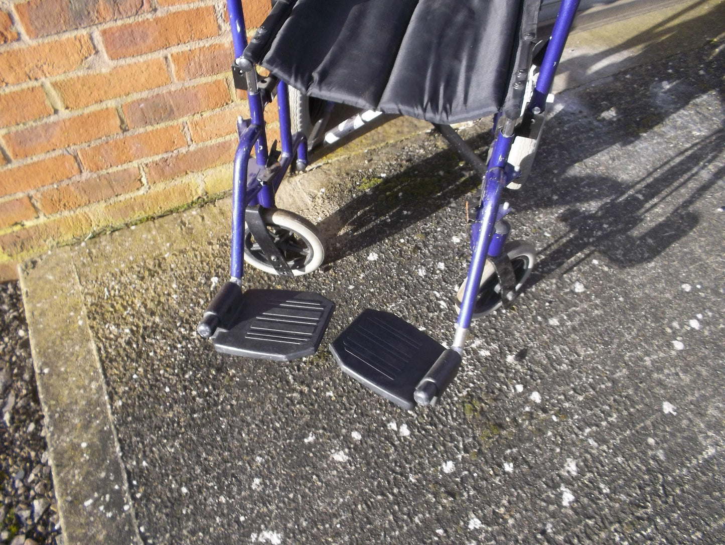 The Invacare Alu Lite Manual Transit Wheelchair