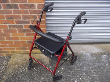 red rollator with 4 wheels shown outside