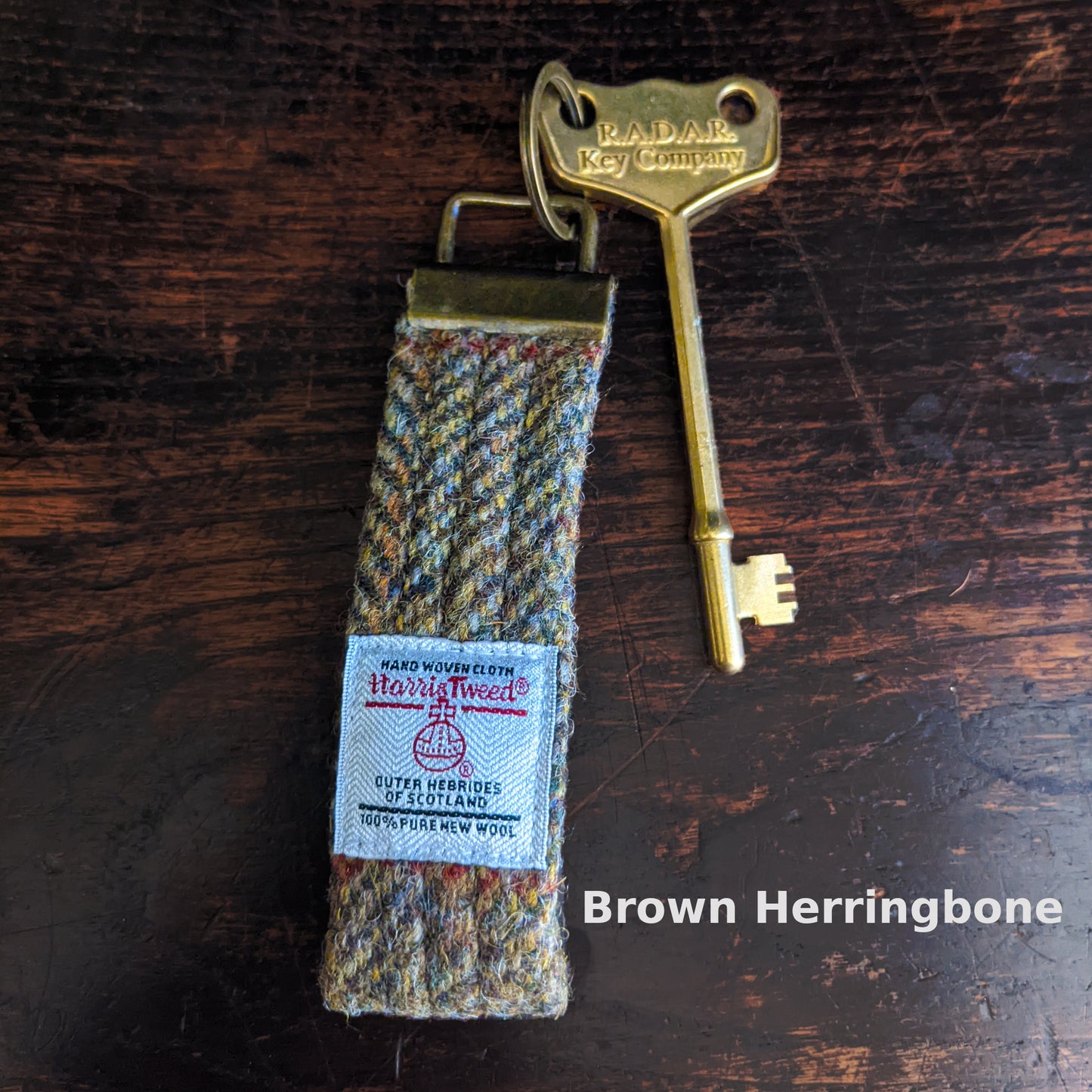 Brass RADAR key with Harris Tweed looped key fob - large head | The RADAR Key Company